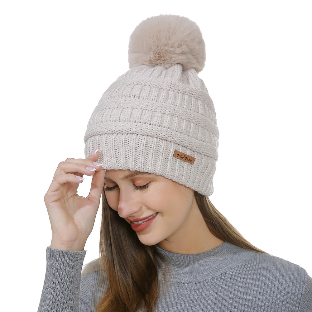 Bonnet en tricot plaire doublé avec pompon en fausse fourrure - Beige